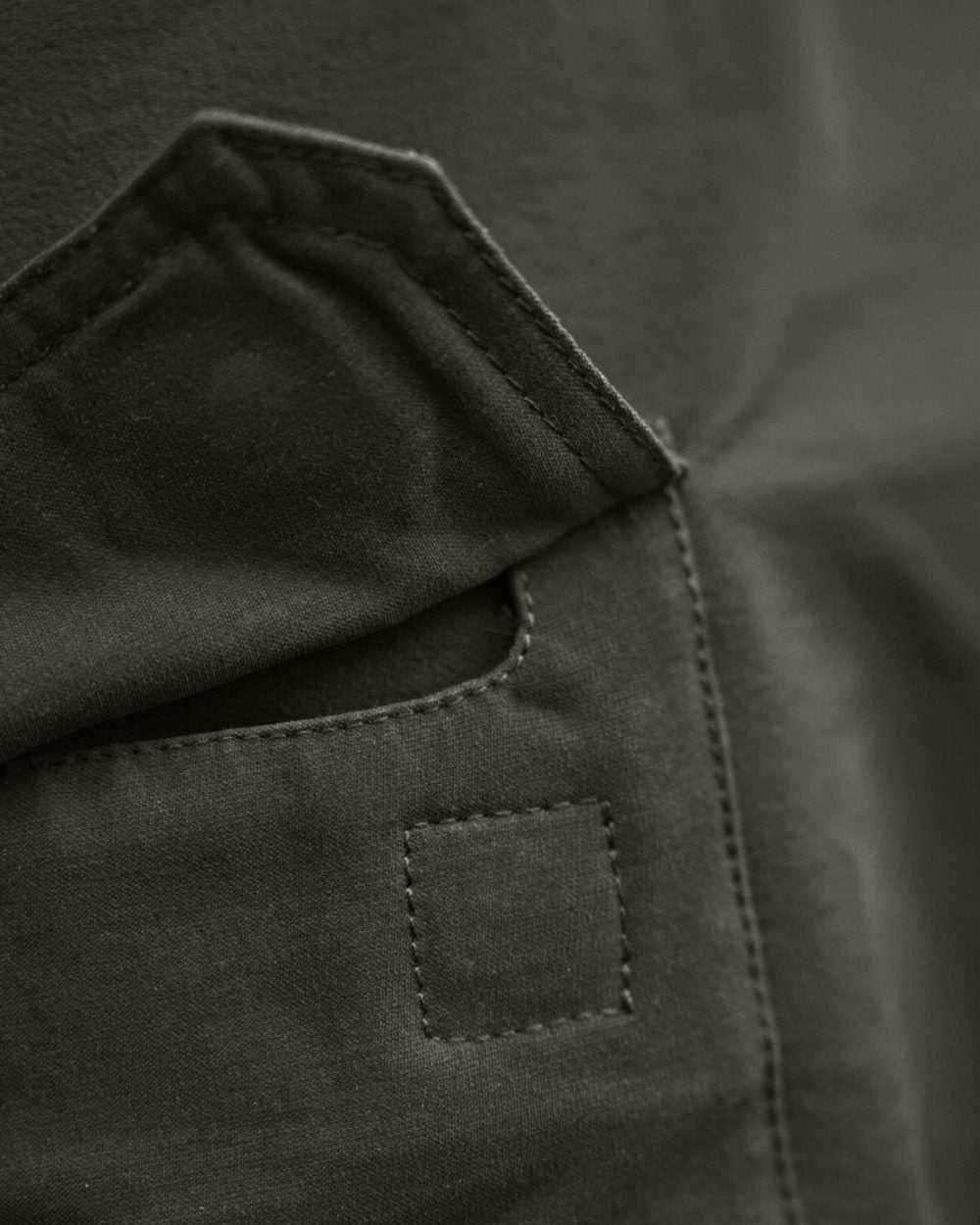 Willow Green Brown Coloured Harkila Hill Trousers on outdoor background 