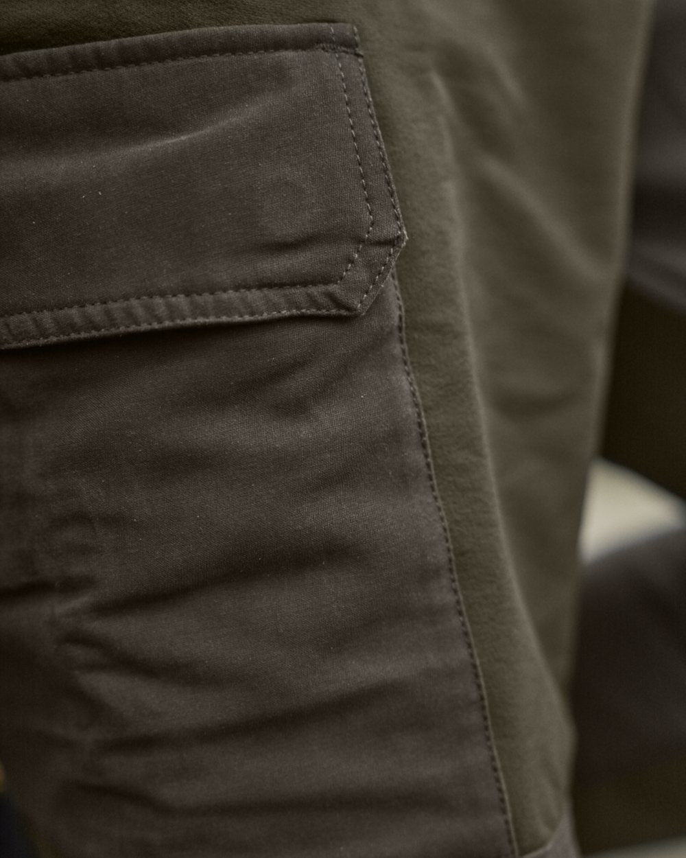Willow Green Brown Coloured Harkila Hill Trousers on outdoor background 