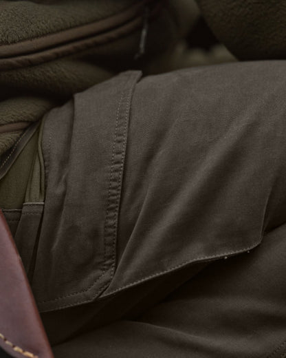 Willow Green Brown Coloured Harkila Hill Trousers on outdoor background 