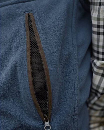 Dark Olive Sea Blue Coloured Harkila Kamko Estate WSP Reversible Waistcoat on outdoor background 