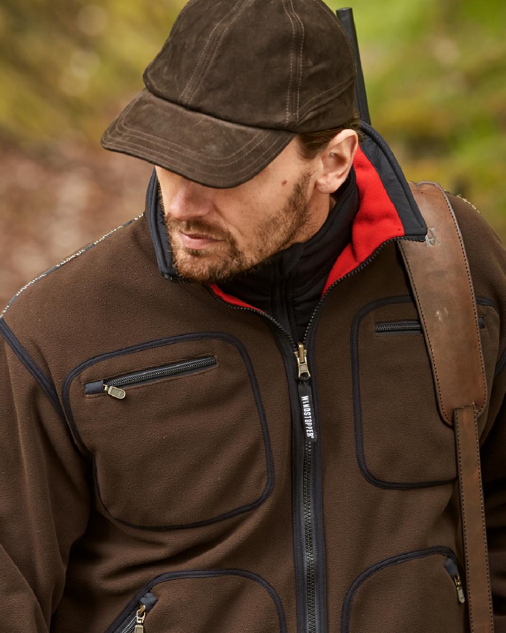Brown Red Coloured Harkila Kamko Fleece on outdoor background 