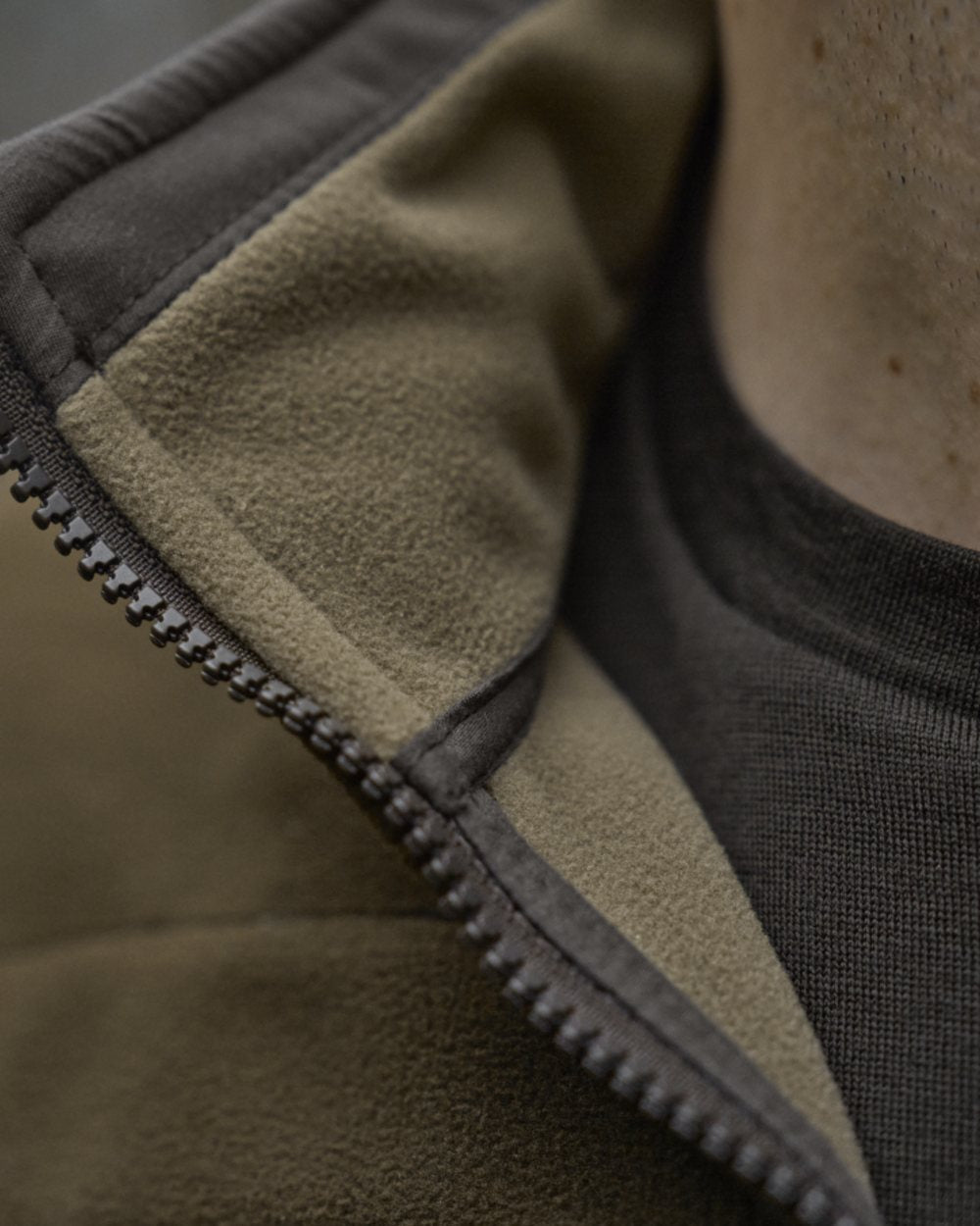 Dark Antique Bronze Willow Green Coloured Harkila Kamko Fleece on outdoor background 