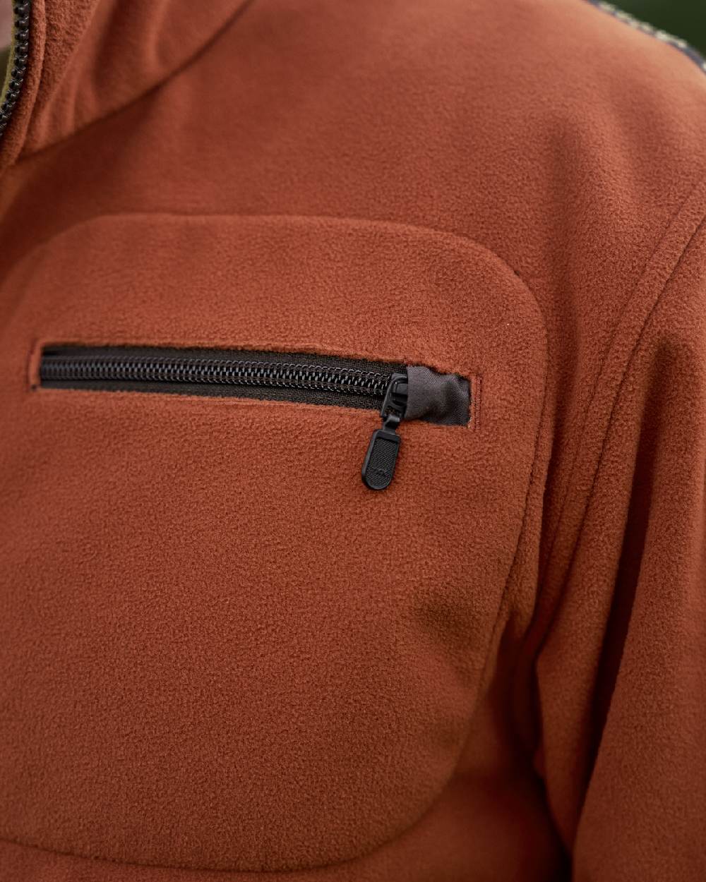 Dark Olive Arabian Spice Coloured Harkila Kamko Fleece on outdoor background 
