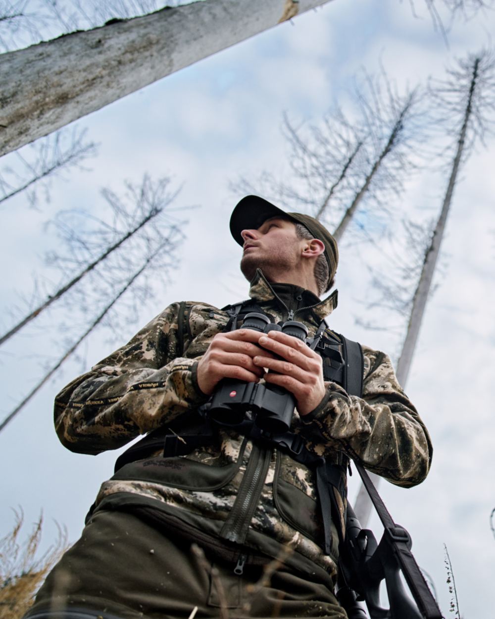 Axis MSP Mountain Shadow Brown Coloured Harkila Kamko Mountain WSP Reversible Fleece Jacket on forest background 