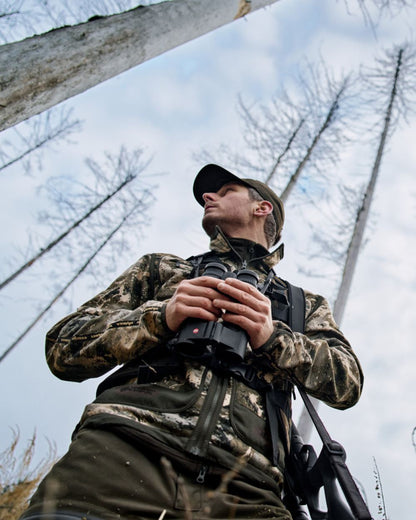 Axis MSP Mountain Shadow Brown Coloured Harkila Kamko Mountain WSP Reversible Fleece Jacket on forest background 
