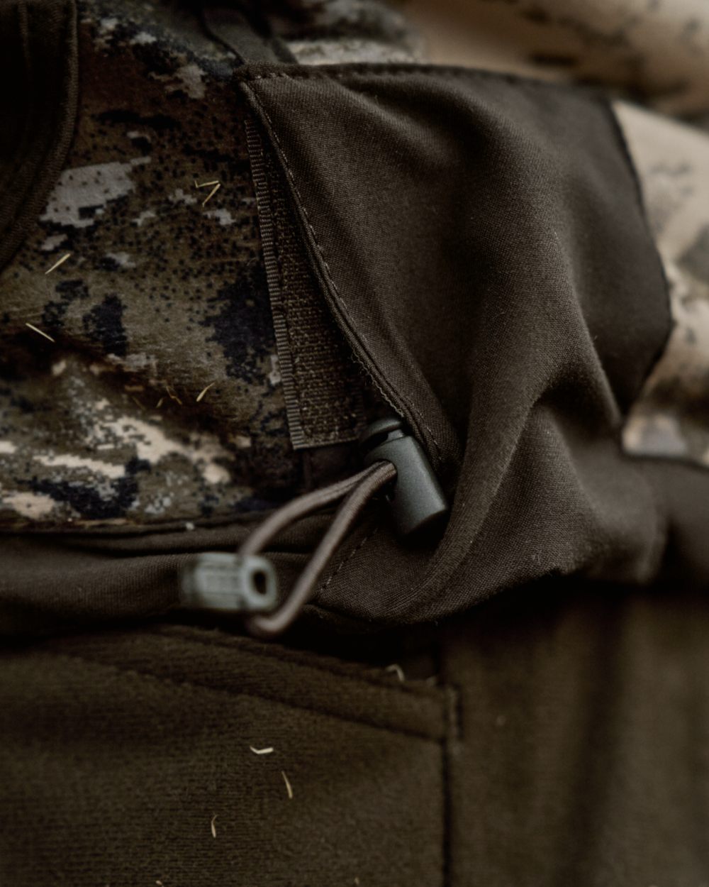 Axis MSP Mountain Shadow Brown Coloured Harkila Kamko Mountain WSP Reversible Fleece Jacket on forest background 