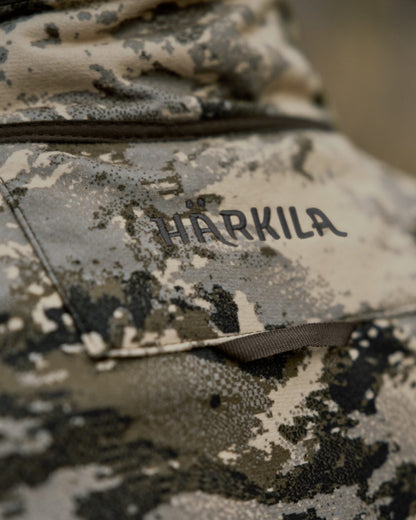 Axis MSP Mountain Shadow Brown Coloured Harkila Kamko Mountain WSP Reversible Fleece Jacket on forest background 