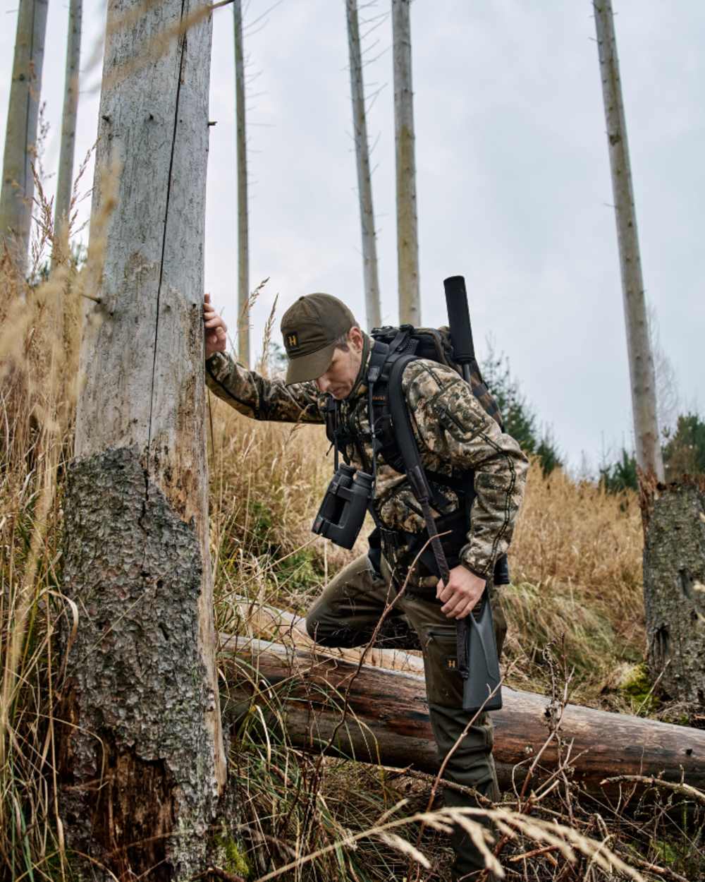 Axis MSP Mountain Shadow Brown Coloured Harkila Kamko Mountain WSP Reversible Fleece Jacket on forest background 