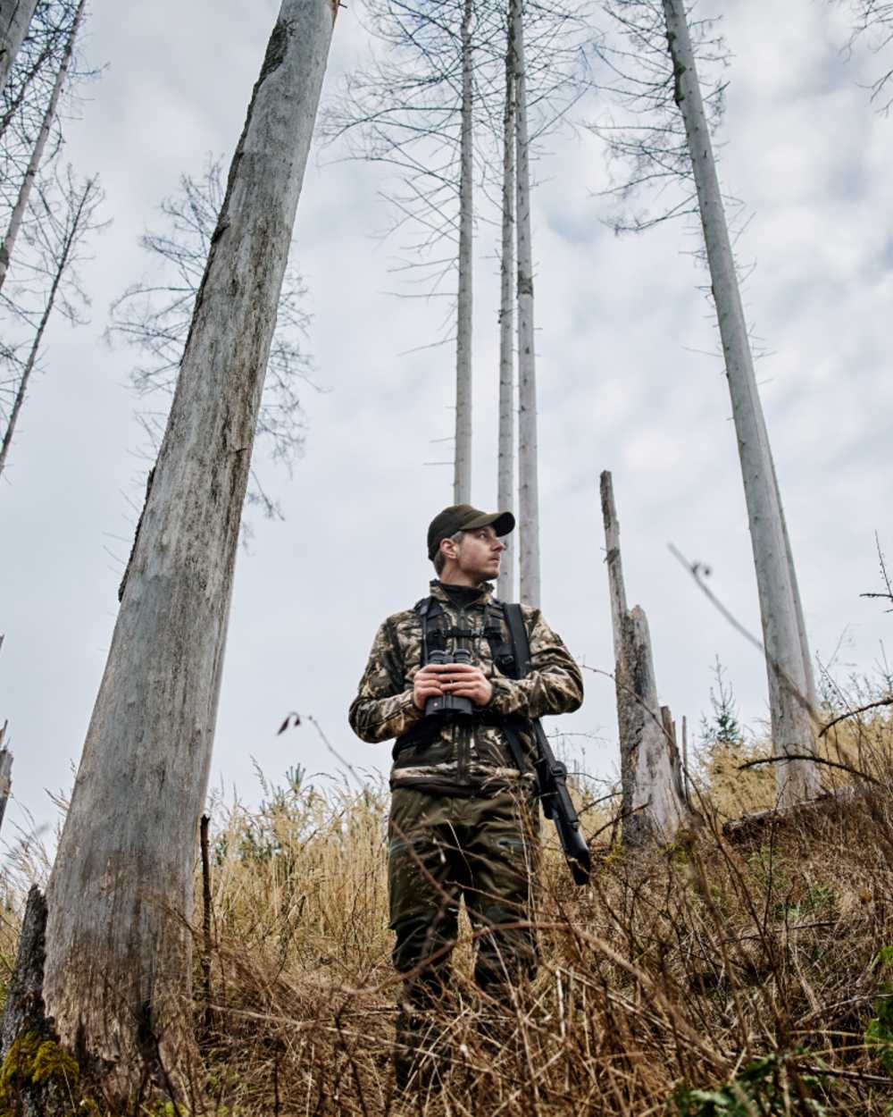 Axis MSP Mountain Shadow Brown Coloured Harkila Kamko Mountain WSP Reversible Fleece Jacket on forest background 