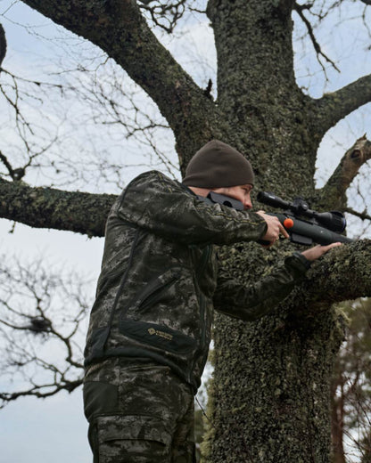 Axis MSP Black Willow Green Coloured Harkila Kamko NOCTYX WSP Reversible Fleece Jacket on outdoor background 