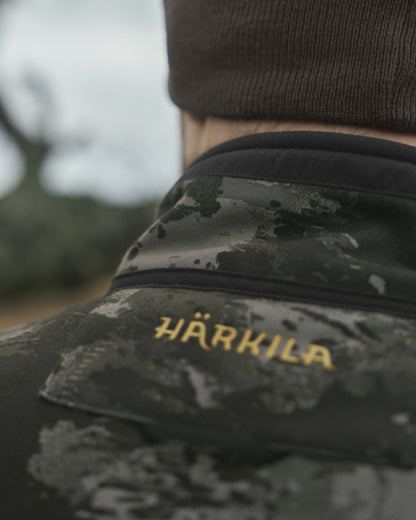 Axis MSP Black Willow Green Coloured Harkila Kamko NOCTYX WSP Reversible Fleece Jacket on outdoor background 