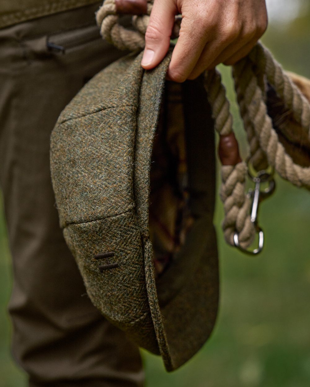 Forest Green Herringbone Coloured Harkila Kenmore Classic Baker Boy Cap on forest background 