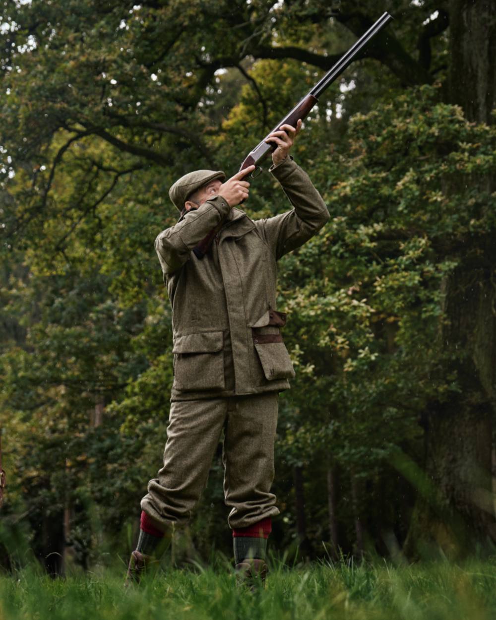 Forest Green Herringbone Coloured Harkila Kenmore GTX Jacket on forest background 