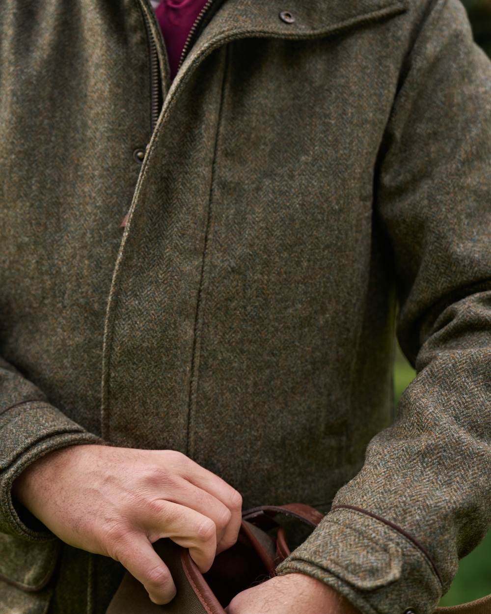 Forest Green Herringbone Coloured Harkila Kenmore GTX Jacket on forest background 