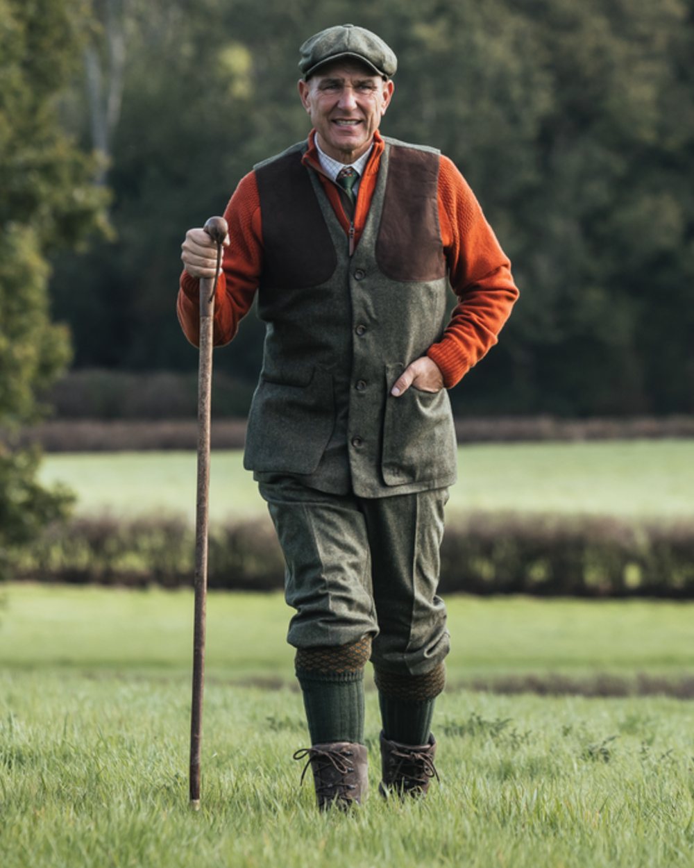 Forest Green Herringbone coloured Harkila Kenmore Shooting Waistcoat on forest background 