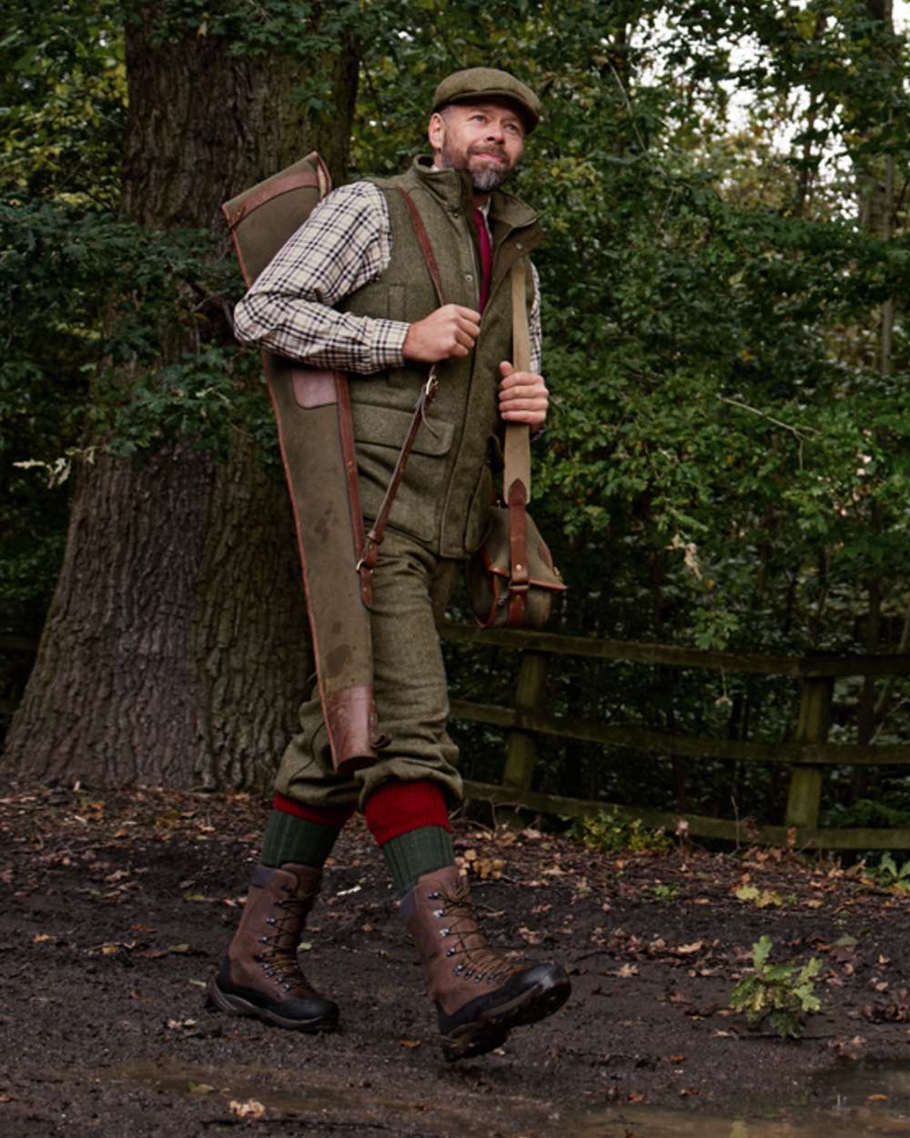 Forest Green Herringbone Coloured Harkila Kenmore Waistcoat on forest background 