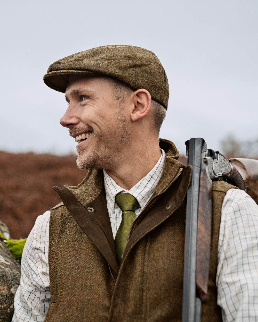 Terragon Brown coloured Harkila Kenmore Waistcoat on sky background 