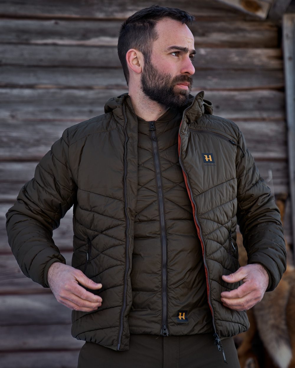 Willow Green Coloured Harkila Logmar Insulated Packable Waistcoat on white background 