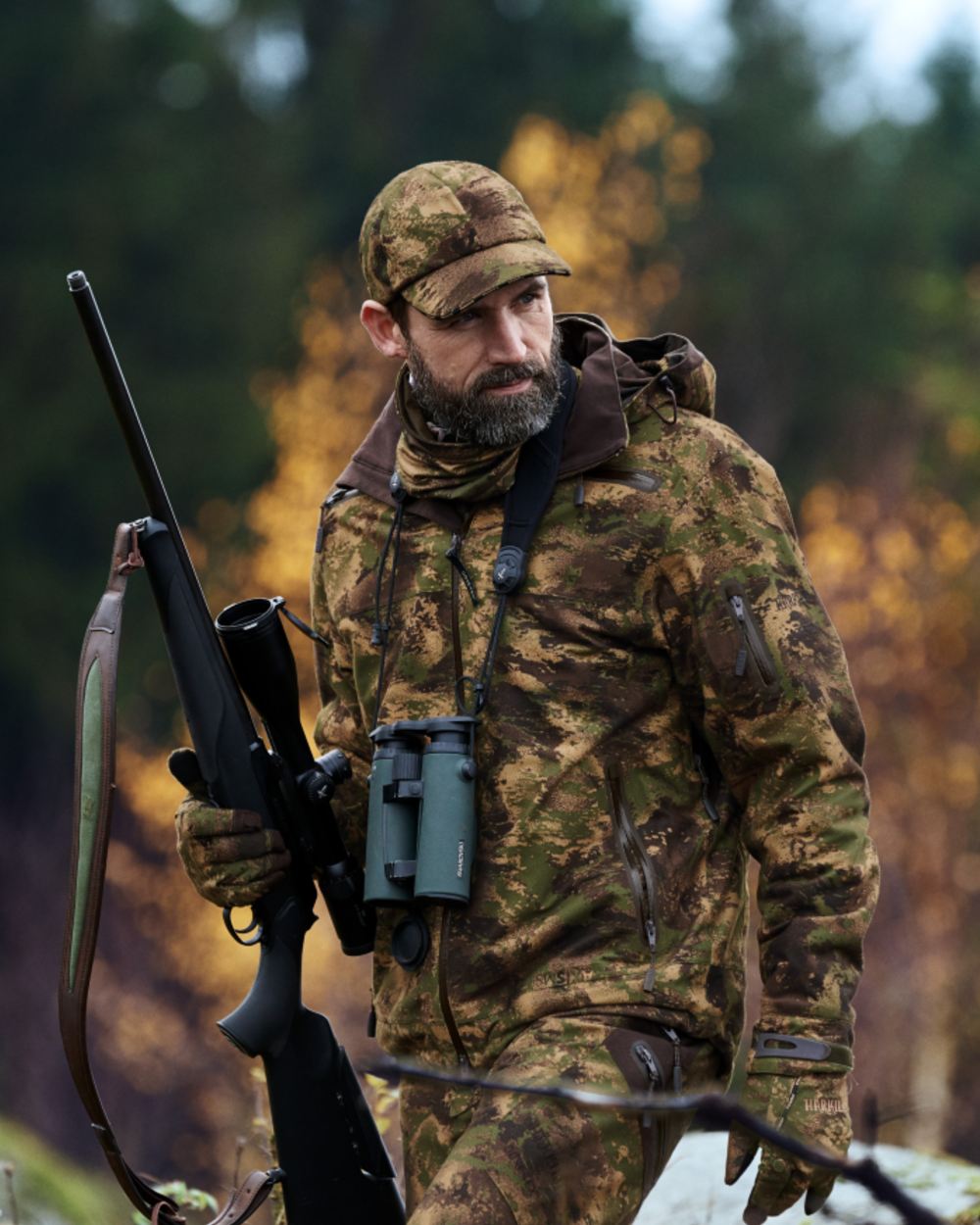 Axis MSP Forest Coloured Harkila Lynx Cap on forest background 