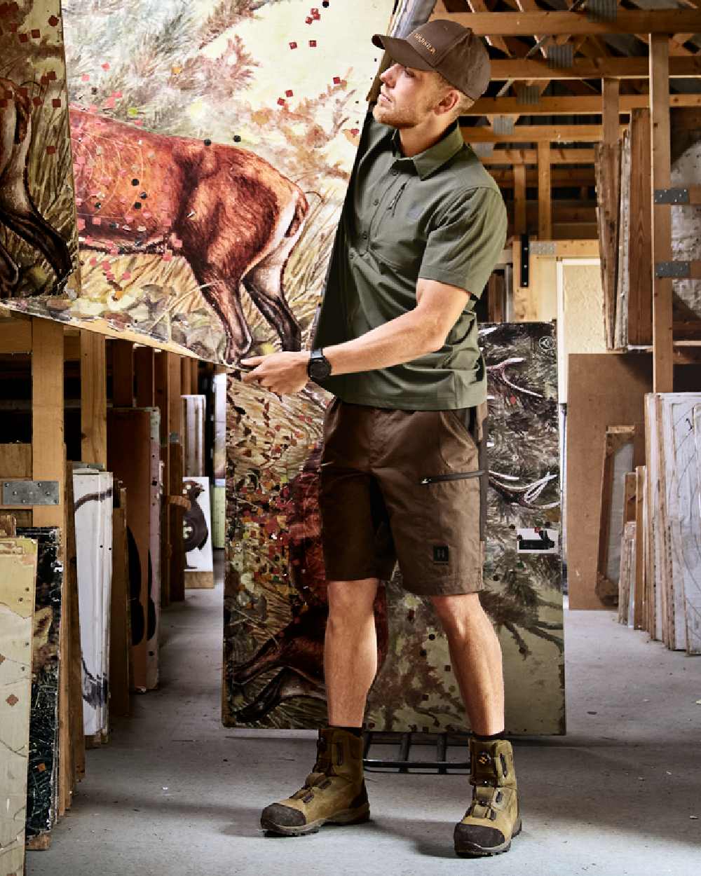 Dark Earth Shadow Brown Coloured Harkila Mens Fjell Shorts on studio background 