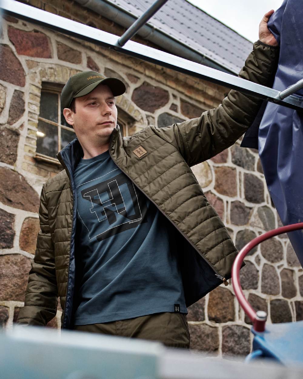 Willow Green Sea Blue Coloured Harkila Mens Kalix HSP Jacket on outdoor background 