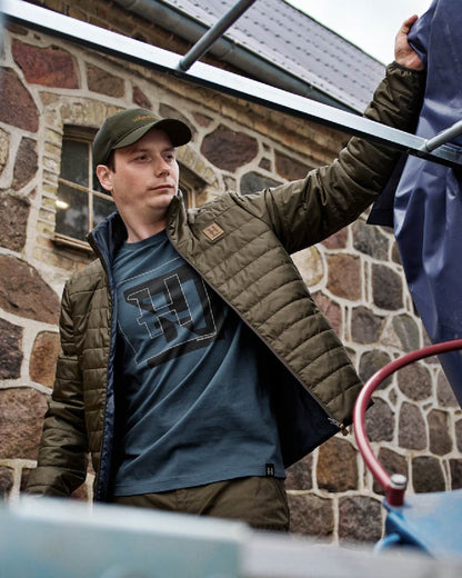 Willow Green Sea Blue Coloured Harkila Mens Kalix HSP Jacket on outdoor background 