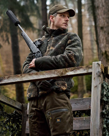 Axis Msp Quantum coloured Harkila Mens Tyst Camo Insulated Jacket on forest background 