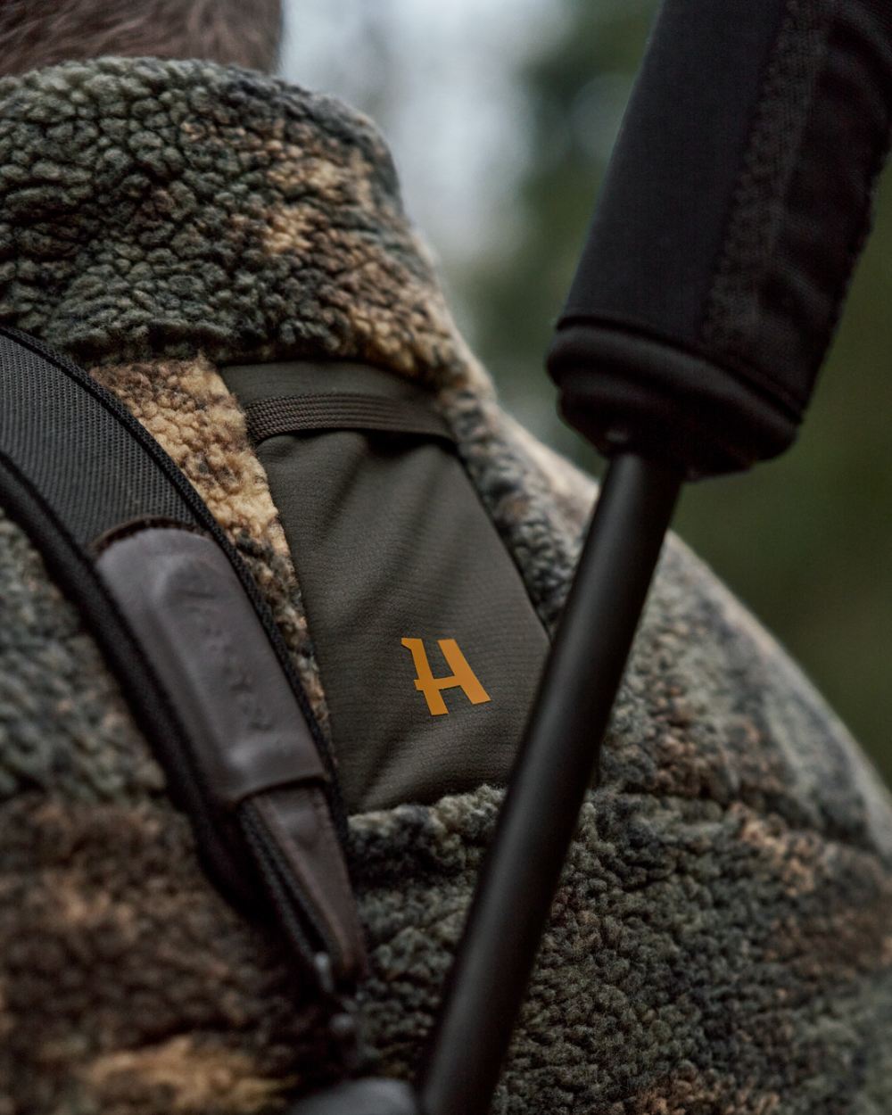 Axis Msp Quantum coloured Harkila Mens Tyst Camo Insulated Jacket on forest background 