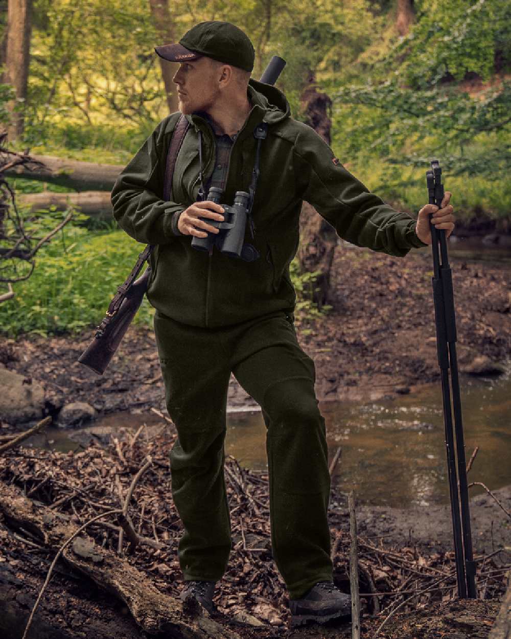 Willow Green Coloured Harkila Metso Hybrid Jacket on forest background 