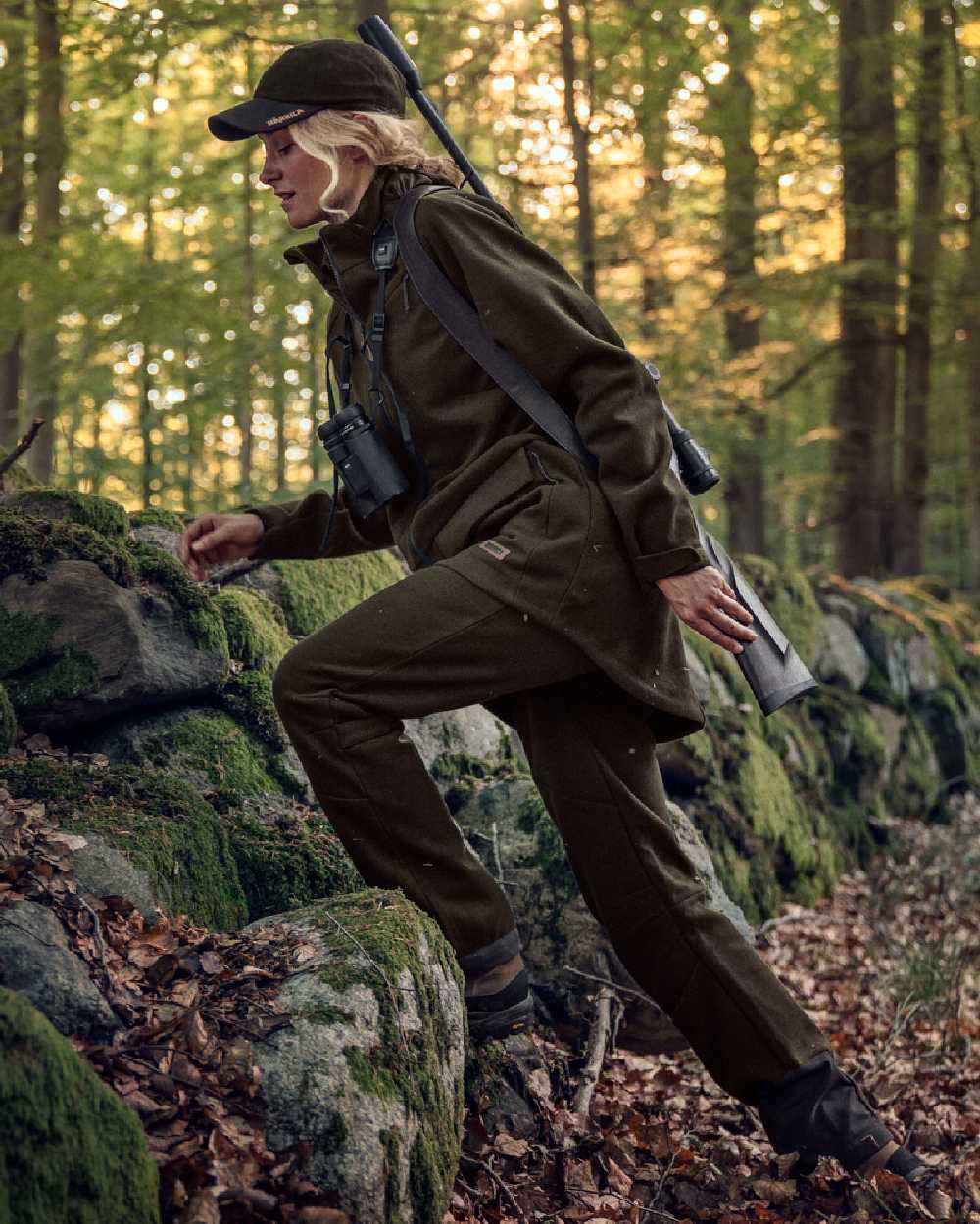 Willow Green Coloured Harkila Metso Womens Hybrid Jacket on outdoor background 