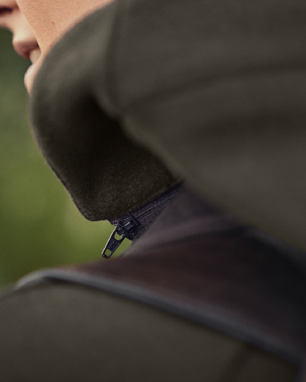 Willow Green Coloured Harkila Metso Womens Hybrid Jacket on outdoor background 