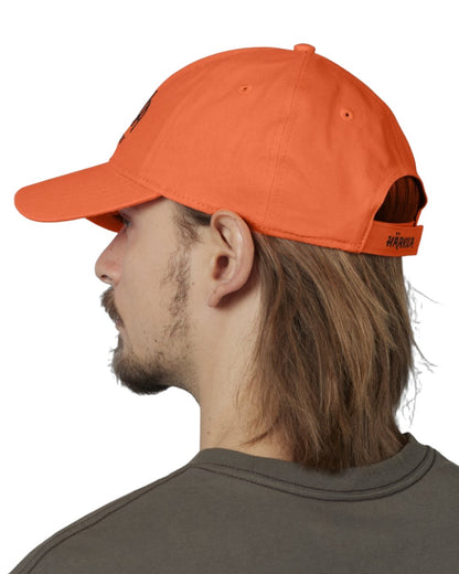 Hi VIs Orange colour Harkila Modi Cap on white background 