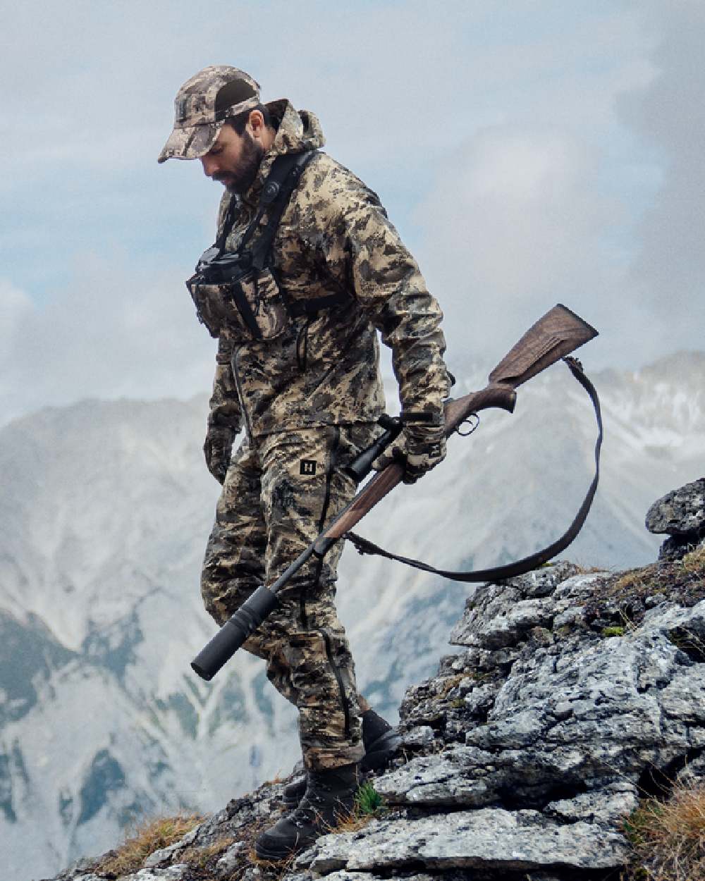 AXIS Mountain Coloured Harkila Mountain Hunter Expedition HWS Packable Jacket on outdoor background 