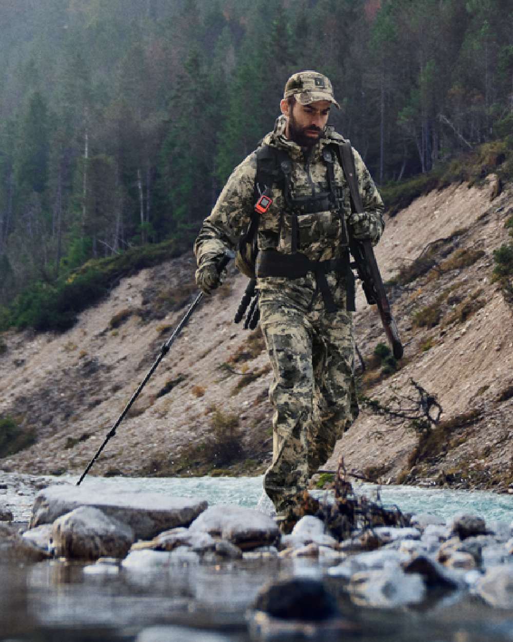 AXIS Mountain Coloured Harkila Mountain Hunter Expedition HWS Packable Jacket on outdoor background 