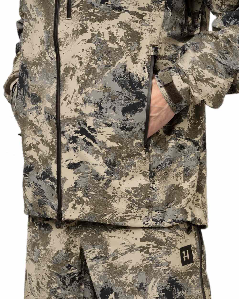 AXIS Mountain Coloured Harkila Mountain Hunter Expedition HWS Packable Jacket on white background 