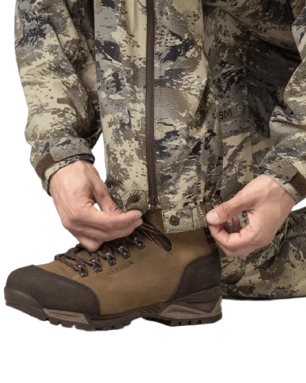 AXIS Mountain Coloured Harkila Mountain Hunter Expedition HWS Packable Trousers on white background 