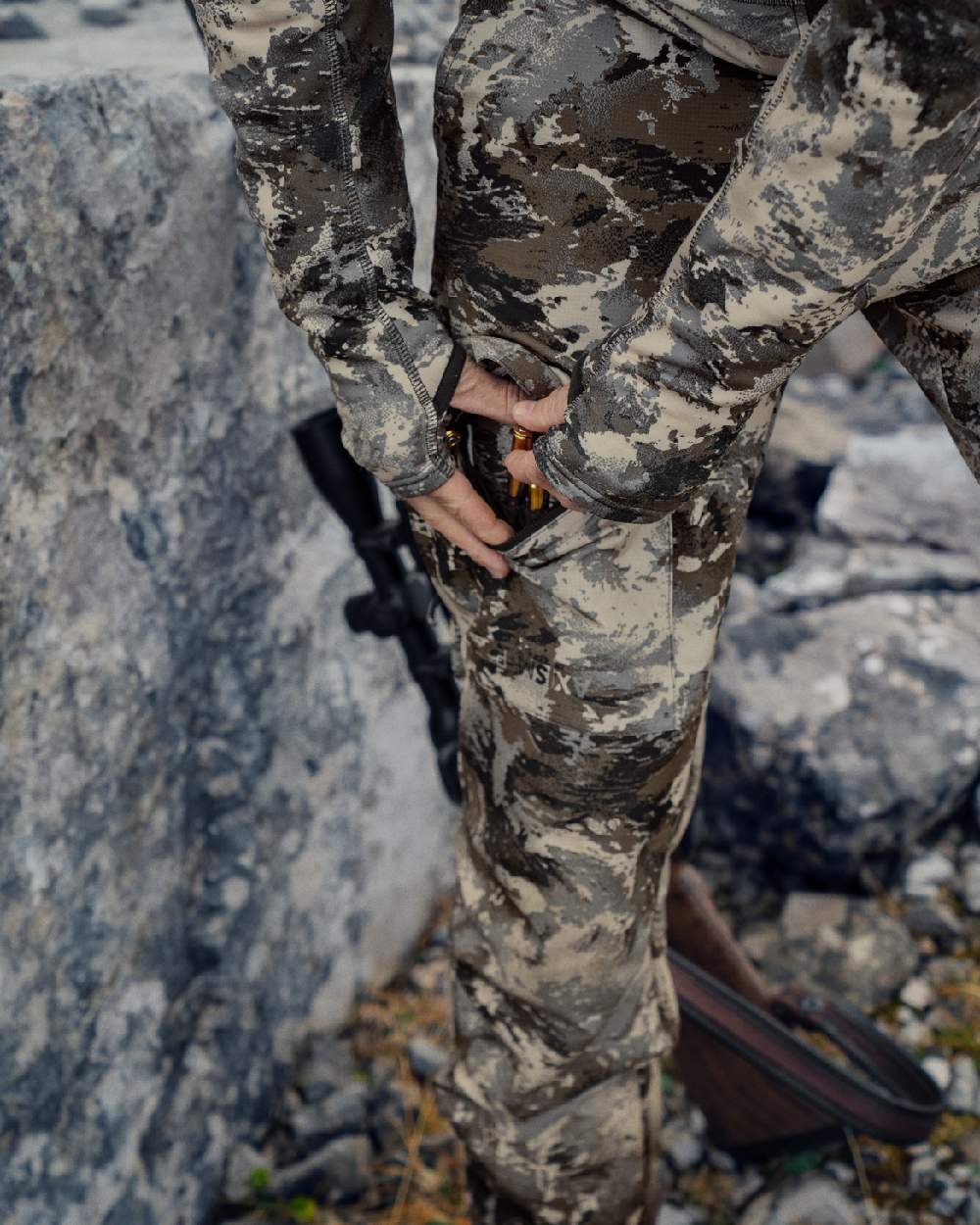 AXIS Mountain Coloured Harkila Mountain Hunter Expedition Light Trousers on outdoor background 