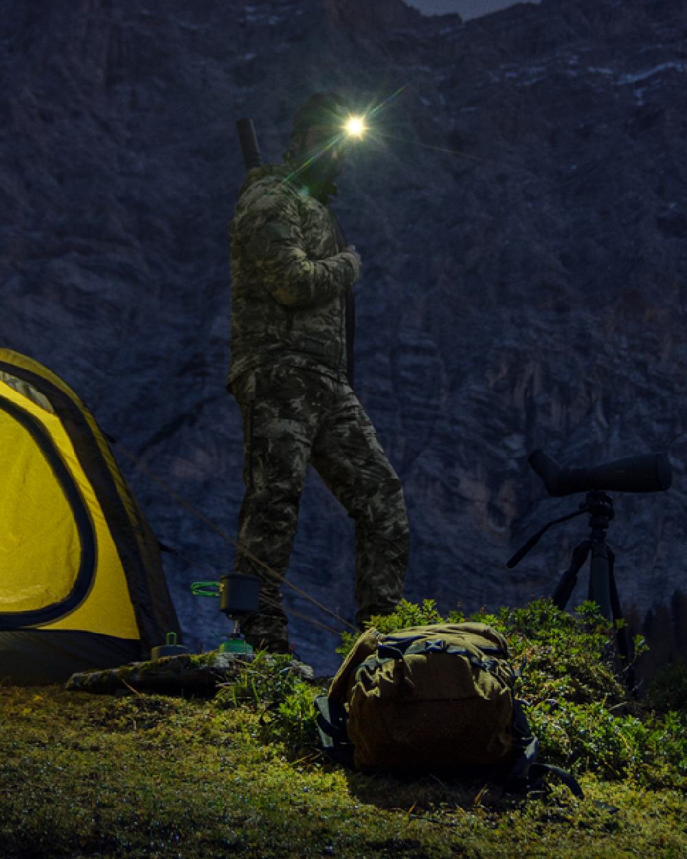 AXIS Mountain Coloured Harkila Mountain Hunter Expedition Packable Down Jacket on outdoor background 