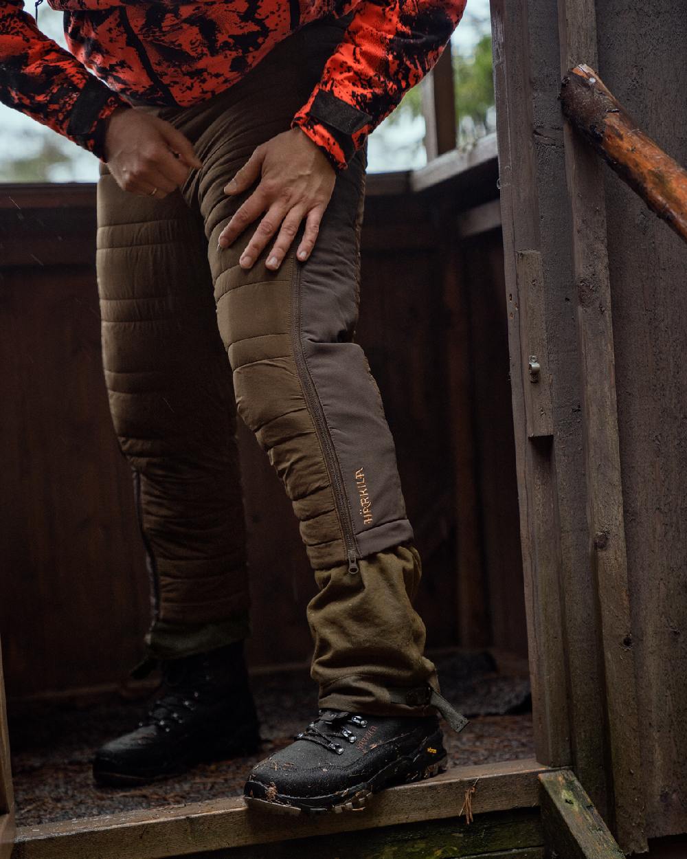 Hunting Green Shadow Brown Coloured Harkila Mountain Hunter Insulated Breeks on outdoor background 