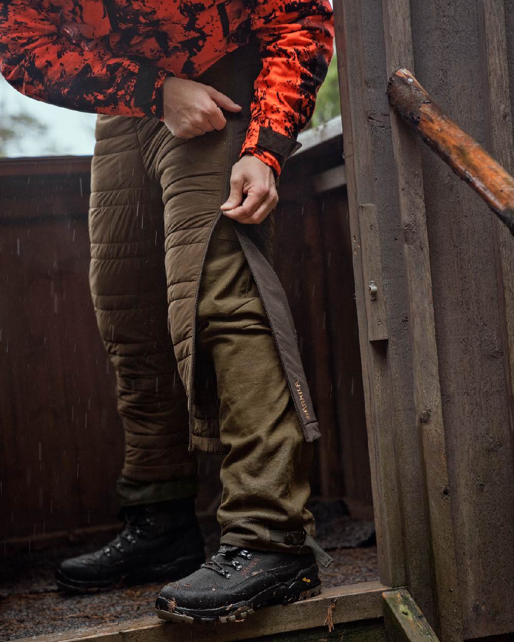 Hunting Green Shadow Brown Coloured Harkila Mountain Hunter Insulated Breeks on outdoor background 
