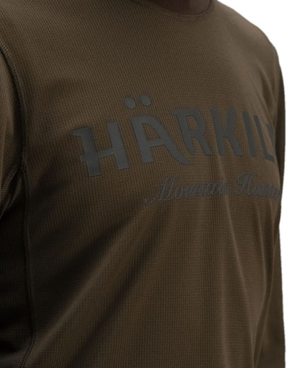 Hunting Green Shadow Brown Coloured Harkila Mountain Hunter Long Sleeve T-Shirt on white background 