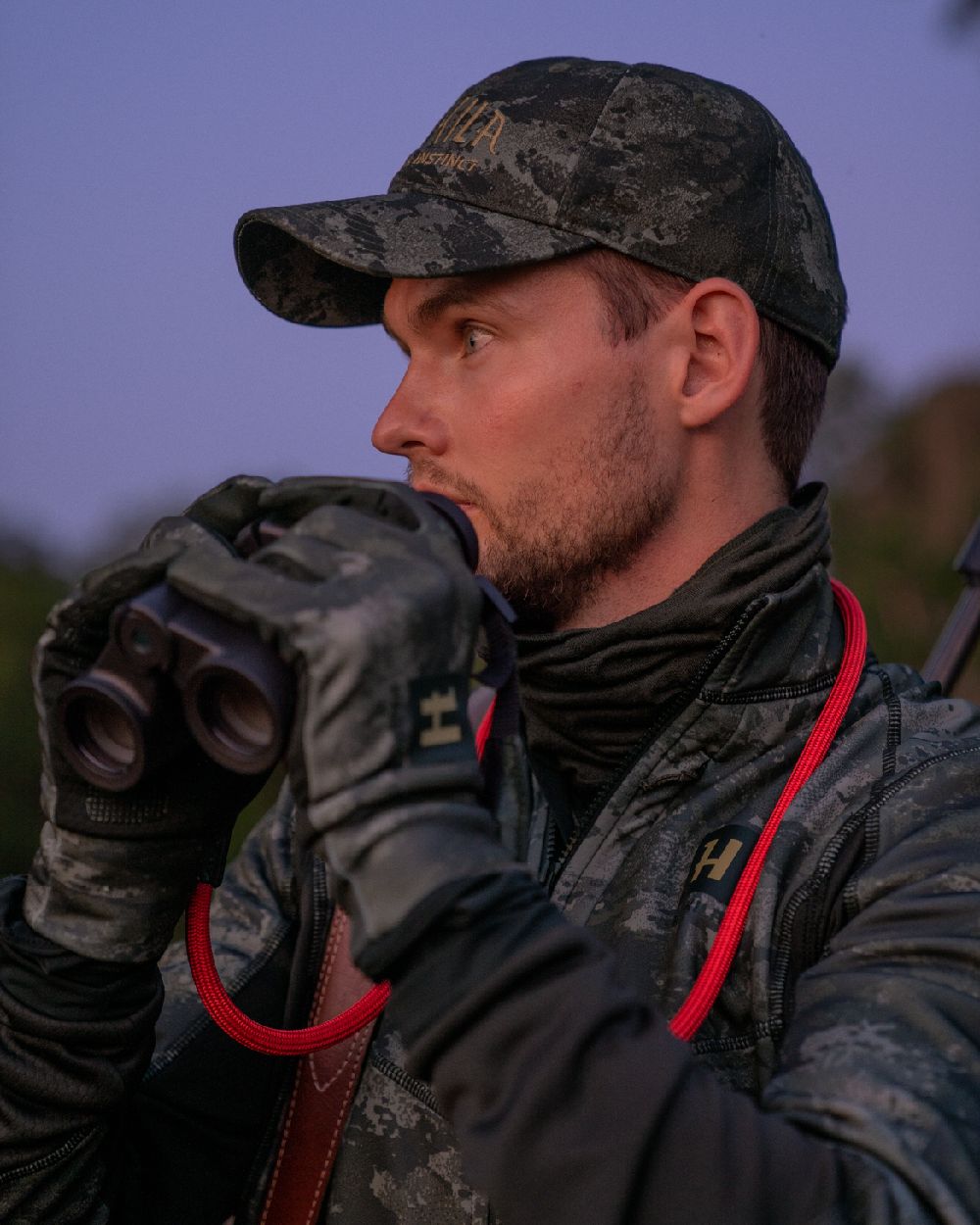 AXIS Black Black Coloured Harkila NOCTYX Camo Light Cap on outdoor background 