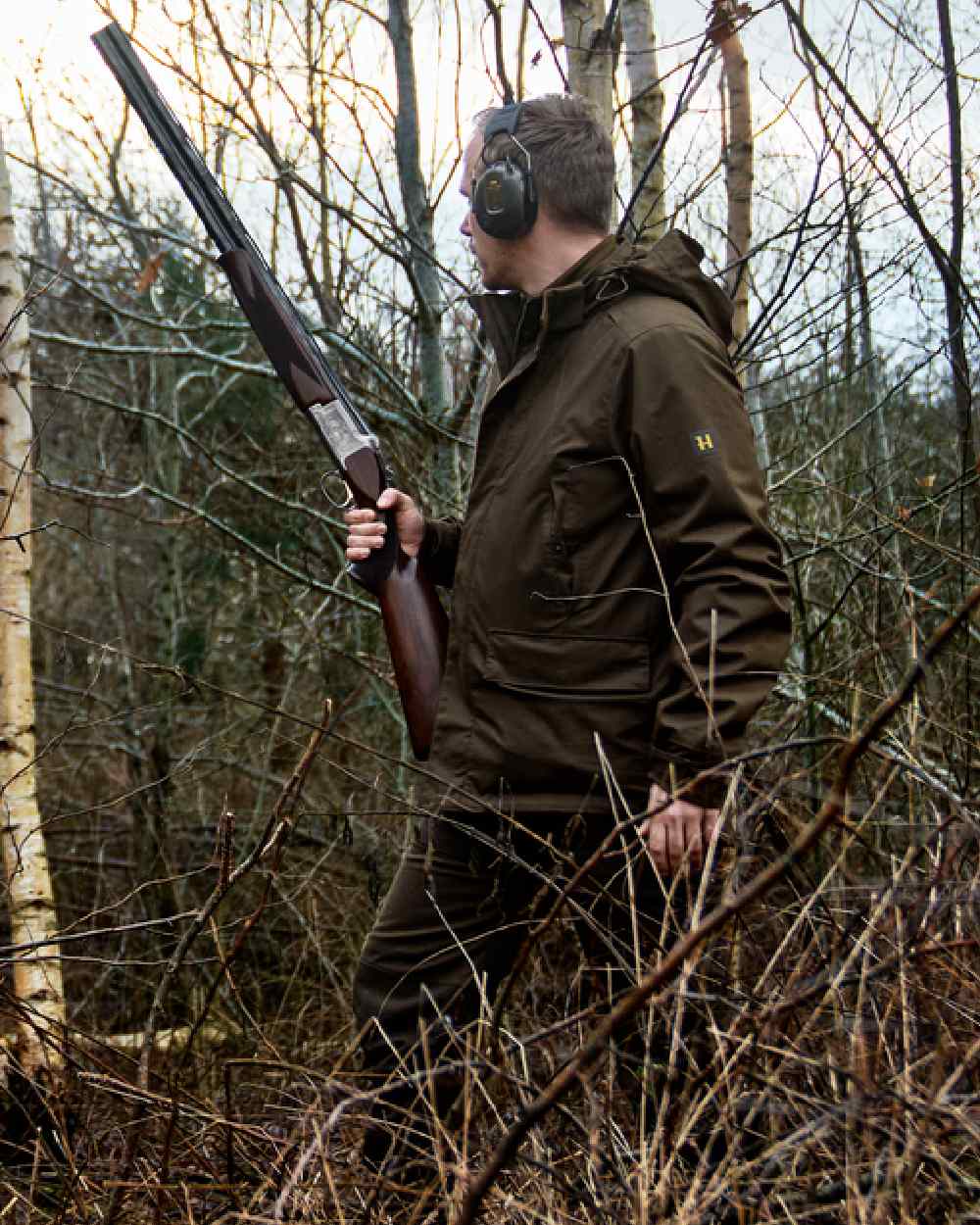 Willow Green Coloured Harkila Nordic Hunter HWS Jacket on outdoor background 