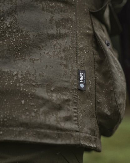 Willow Green Coloured Harkila Orton Packable Lady Jacket on outdoor background 