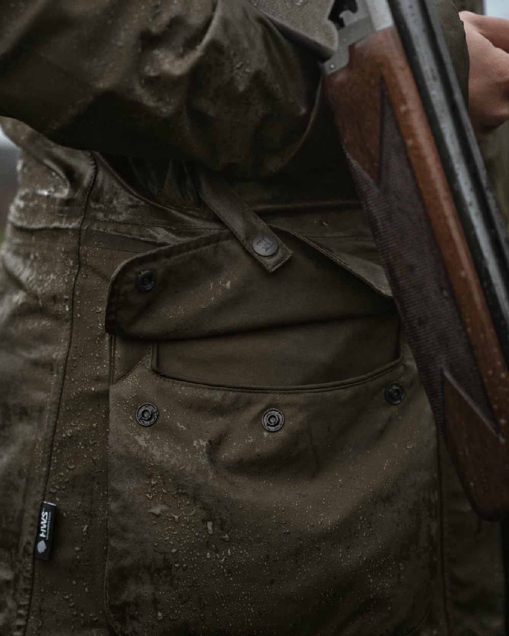 Willow Green Coloured Harkila Orton Packable Lady Jacket on outdoor background 