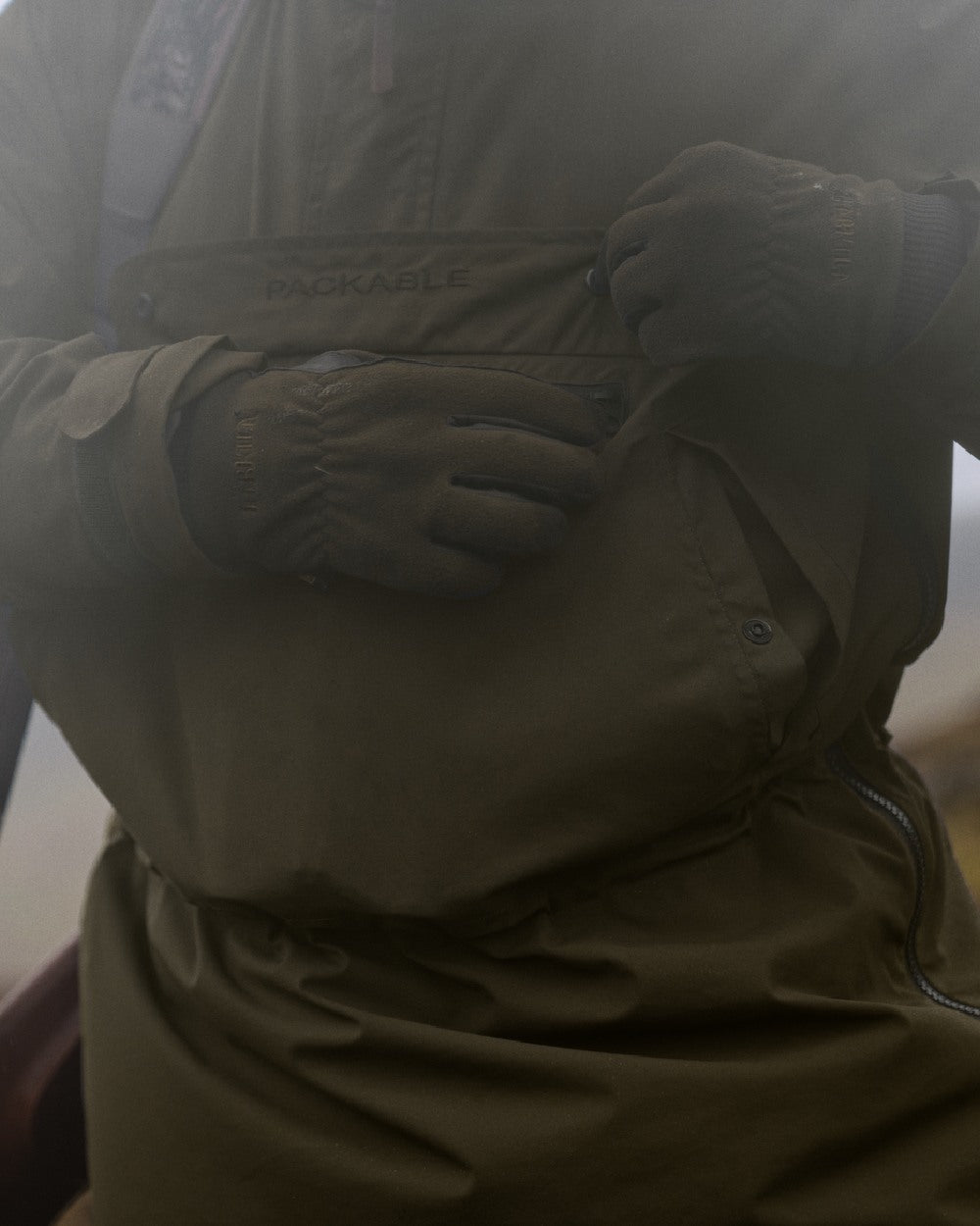 Willow Green Coloured Harkila Orton Tech HWS Packable Smock on outdoor background 