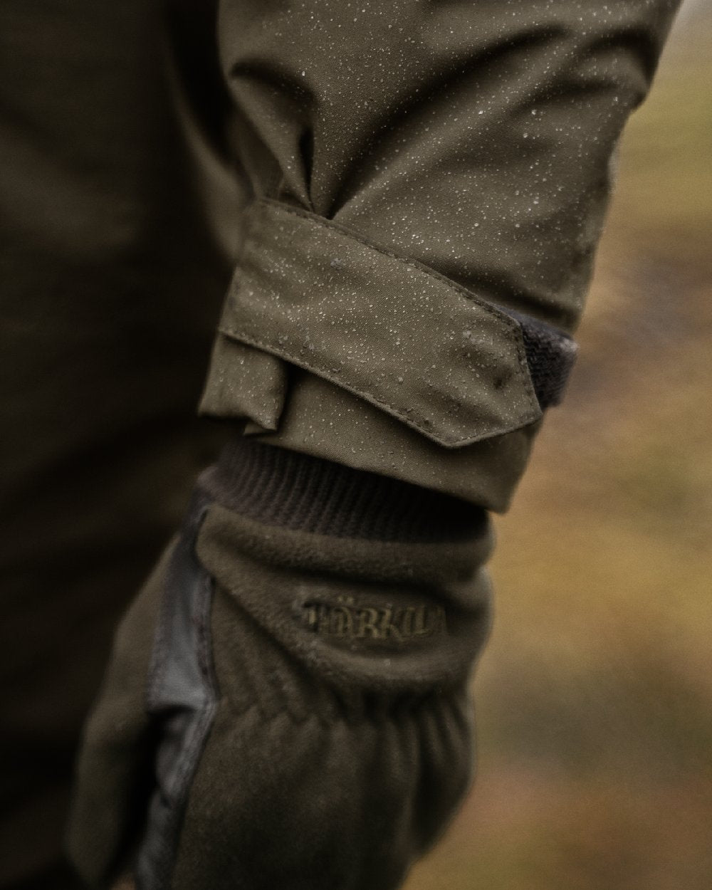 Willow Green Coloured Harkila Orton Tech HWS Packable Smock on outdoor background 