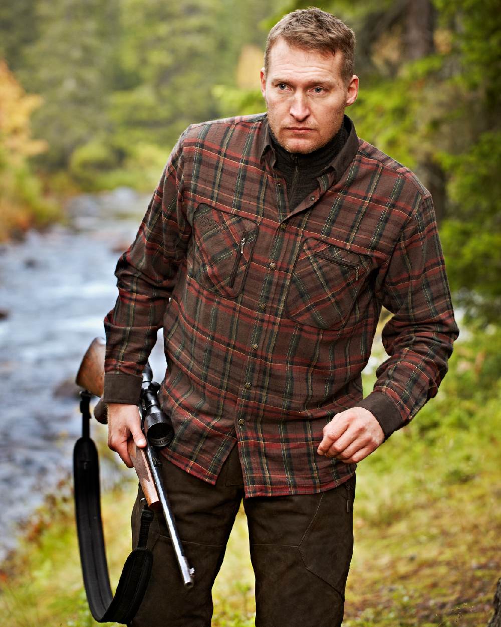 Red Check Coloured Harkila Pajala Check Shirt on outdoor background 