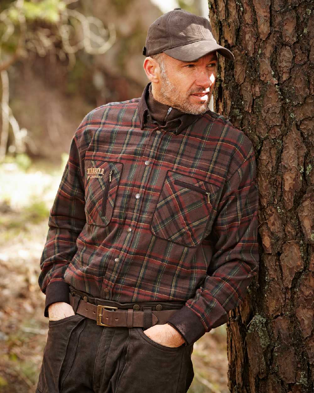 Red Check Coloured Harkila Pajala Check Shirt on outdoor background 