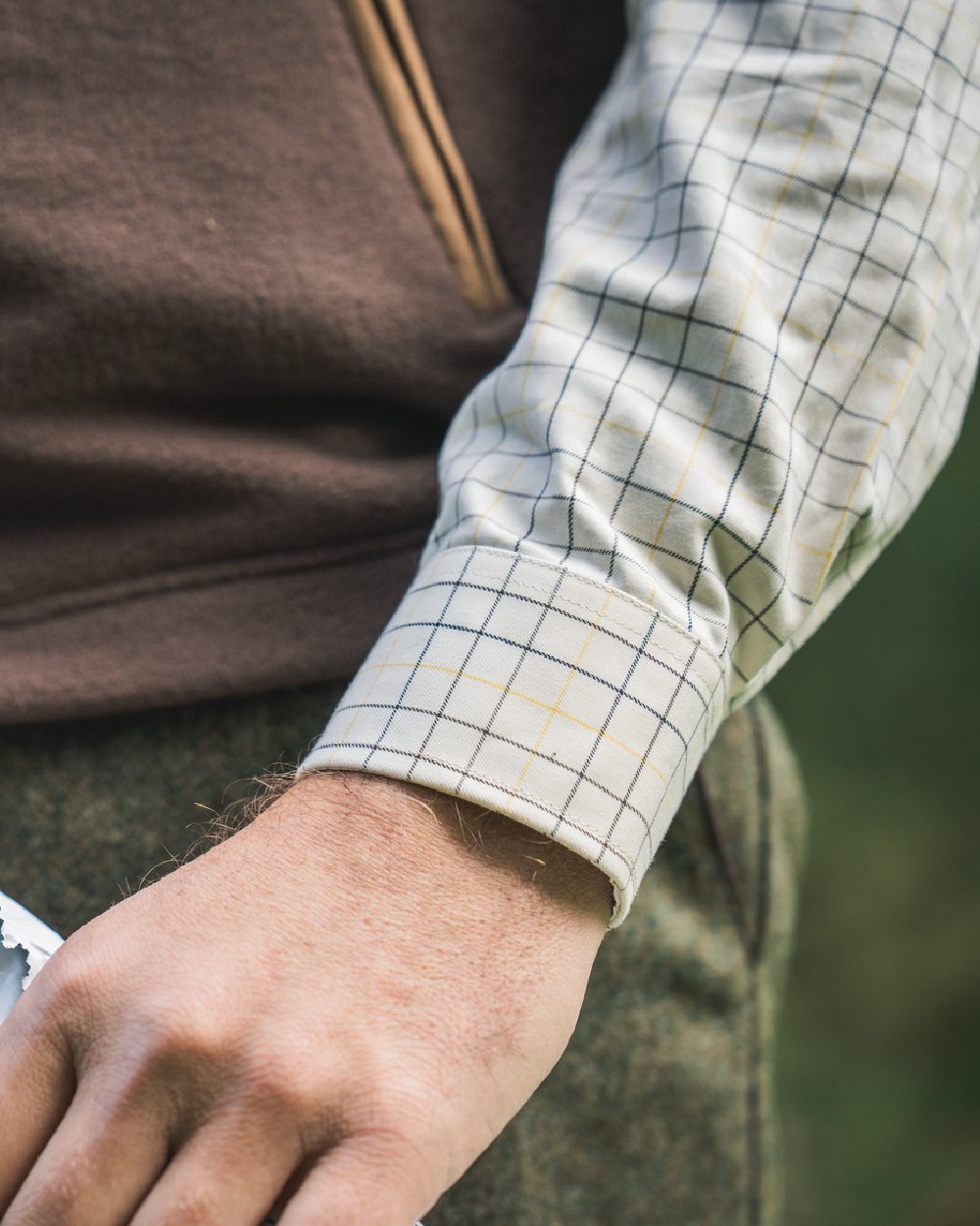 Grape Leaf Coloured Harkila Portfield Long Sleeve Shirt on blurry background 